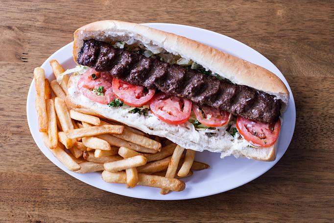Product: Beef koobideh (ground) sandwich made with, mayo, parsley, onion, tomato, lettuce on your choice of bread, French roll or lavash wrap (thin bread) - Aiden's Grill in la crescenta / montrose / sunlandtujunga  /goendale - Glendale, CA Mediterranean Restaurants