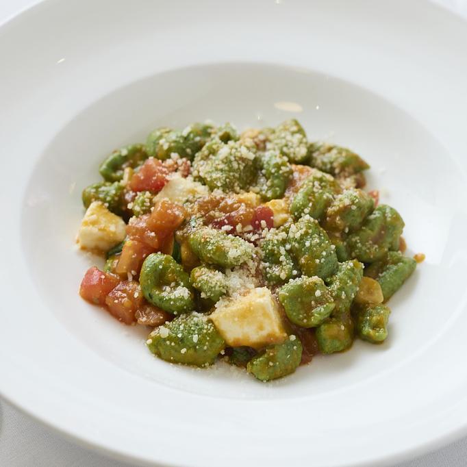 Product: Spinach potato gnocchi in a tomato sauce with mozzarella, basil and topped with parmigiano cheese - Angelino Restaurant in Sausalito, CA Italian Restaurants