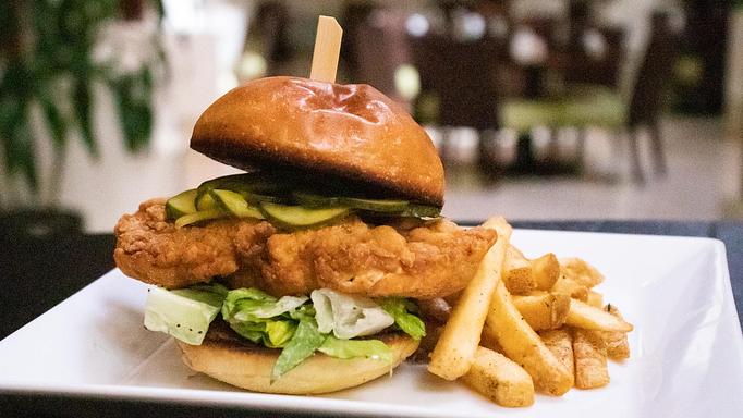 Product: chopped lettuce, b&b pickles, poppy seed dressing, brioche bun / 17 - Coastal Kitchen and Bar in Uptown - Charlotte, NC American Restaurants