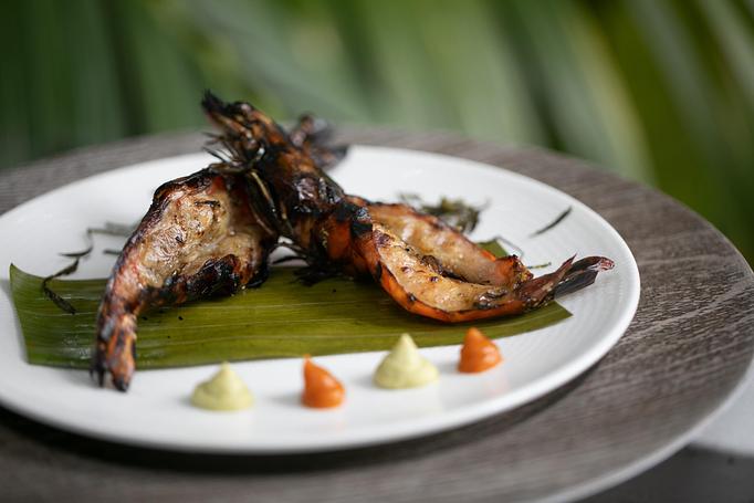 Product: Grilled Jumbo Sun Shrimp Tails | kaffir lime ginger butter, spicy sambal - Essensia Restaurant at The Palms Hotel & Spa in Miami Beach - Miami Beach, FL Global Restaurant