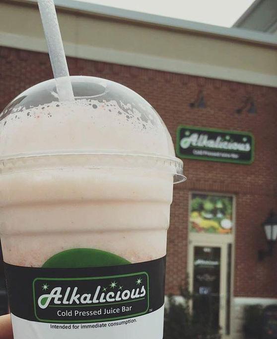Product: Our Island Blast has all the natural tastes of the tropics with pineapple, mango and strawberry. (Picture shown with vanilla protein added) - Alkalicious Cold Pressed Juice Bar in Greenbrier East - Chesapeake, VA Organic Restaurants