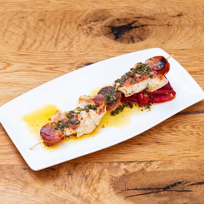 Product: Chicken & Chorizo Skewer, Grilled Piquillo Peppers, Herb Oil on a wooden table - Cafe Ba-Ba-Reeba! in Lincoln Park - Chicago, IL Gluten Free Restaurants