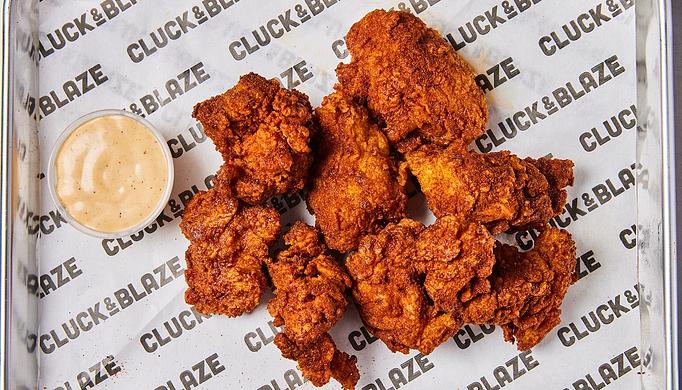 Product: 6 oz Chicken Bites served with our signature Comeback Sauce. - Cluck & Blaze in Glendale, CA American Restaurants