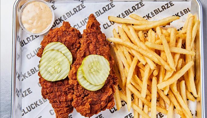 Product: 2 Jumbo Tenders served with a side of your choice (Fries, Tater Tots, Mac & Cheese or Coleslaw). - Cluck & Blaze in Glendale, CA American Restaurants