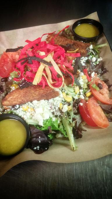 Product: Roadhouse Salad with Blackened Tilapia - Deep Run Roadhouse in West End - Richmond, VA Barbecue Restaurants Product: Roadhouse Salad with Blackened Tilapia - Deep Run Roadhouse in West End - Richmond, VA Barbecue Restaurants