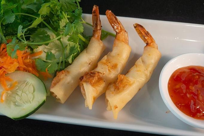 Product: Crispy fried jumbo shrimp wrapped in egg roll shell - Eurasian Bistro in Argonaut Village - Pensacola, FL Vietnamese Restaurants
