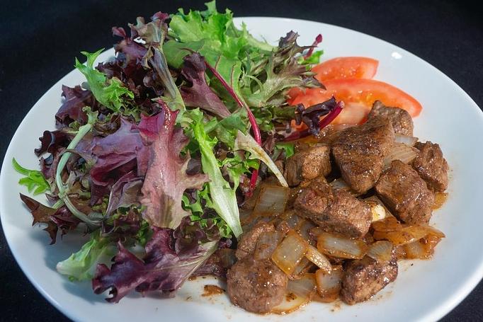 Product: Diced petite tender steaks with mix greens lettuce tossed in Vietnamese vinaigrette - Eurasian Bistro in Argonaut Village - Pensacola, FL Vietnamese Restaurants
