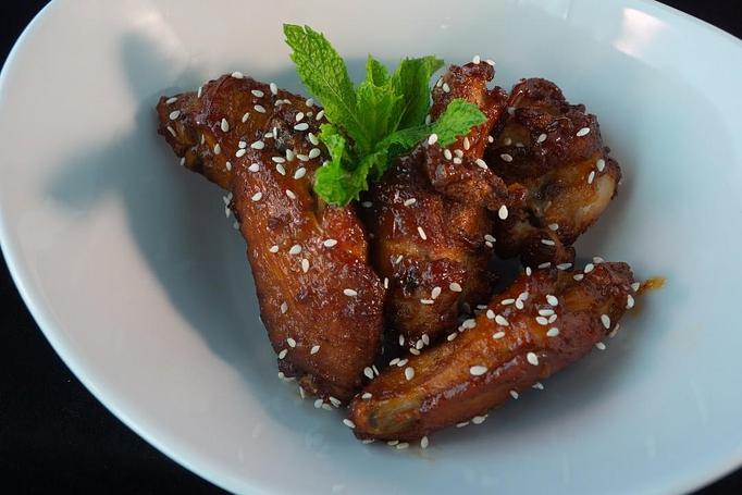 Product: Delicious fried wings bbq, lemon pepper, sweet chili, or house special flavor - Eurasian Bistro in Argonaut Village - Pensacola, FL Vietnamese Restaurants