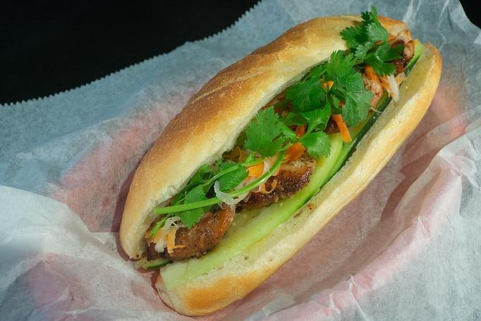 Product: Grilled chicken with cucumber, cilantro, jalapeno pepper, and pickled carrot in a demi baguette - Eurasian Bistro in Argonaut Village - Pensacola, FL Vietnamese Restaurants