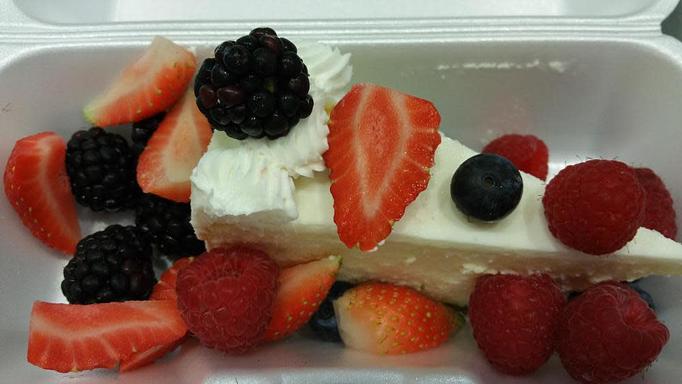 Product: Cheese Cake topped with any fresh fruit - Hollywood Rock Cafe in located directly in the heart of the Walk of Fame (Hollywood Blvd) - Los Angeles, CA American Restaurants