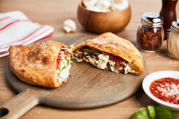 Product - Johnny's New York Style Pizza in Kennesaw, GA Pizza Restaurant Product - Johnny's New York Style Pizza in Kennesaw, GA Pizza Restaurant