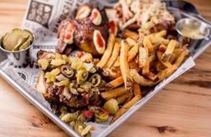 Product: Three house-smoked meats: beef brisket with giardiniera, pulled chicken with LBC white sauce, hot link with garlic aioli drizzle; served with Frites and house-made pickles - Longtable Beer Cafe in Downtown Middleton - Middleton, WI American Restaurants