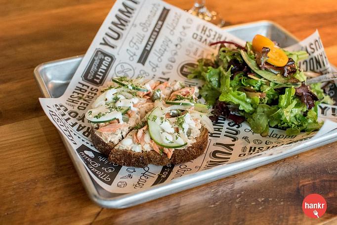 Product: SmRushing Waters smoked trout spread and pieces, pickled onion, cucumber, creme fraiche, fresh dill, open face on Madison Sourdoughoked Trout Sandwich - Longtable Beer Cafe in Downtown Middleton - Middleton, WI American Restaurants