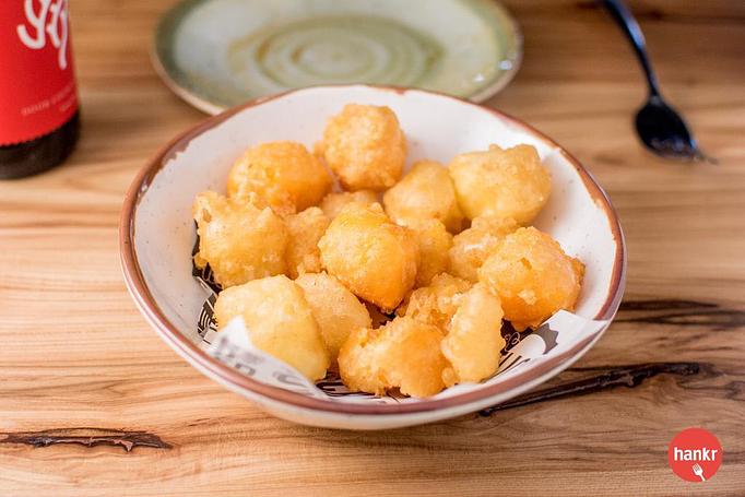 Product: Clock Shadow Creamery cheddar curds, hand-battered in Belgian-style witbier - Longtable Beer Cafe in Downtown Middleton - Middleton, WI American Restaurants