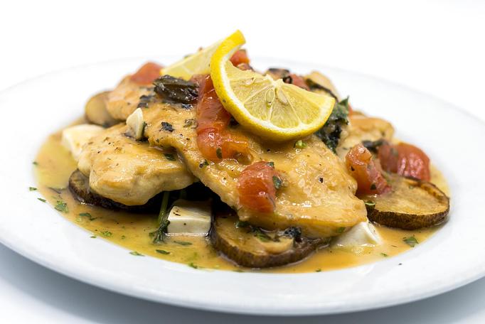 Product: SAUTÉED CHICKEN Diced Roma tomatoes, fresh mozzarella, basil, toasted pine nuts, lemon scampi olive oil, parmesan roasted potatoes 24.95 - Mill Creek Tavern in Bayville, NY American Restaurants