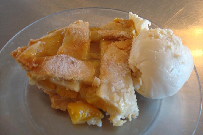 Product: Pie by the Slice. Cherry, Apple, Pecan, Buttermilk, and Peach Pie available. - Nutshell Eatery & Bakery in Granbury, TX American Restaurants