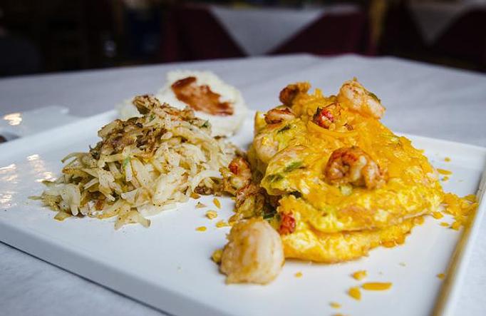 Product: Seafood Omelet - Oceana Grill in New Orleans, LA Cajun & Creole Restaurant