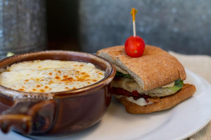 Product: French Onion Soup - A House Specialty. Shown w Half Sandwich - Pine Tree Barn in Wooster, OH American Restaurants