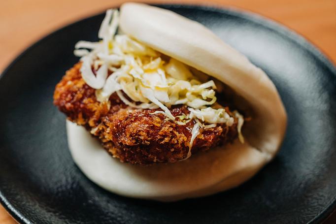 Product: fried chicken, spicy mustard, japanese bbq sauce and kewpie mayo on a steamed bun - RAMEN-SAN Whisky Bar in Fulton Market - Chicago, IL Japanese Restaurants