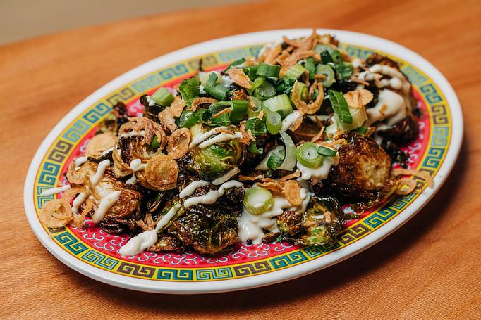 Product: crispy brussels sprouts topped with tofu sauce and crispy shallots - RAMEN-SAN Whisky Bar in Fulton Market - Chicago, IL Japanese Restaurants