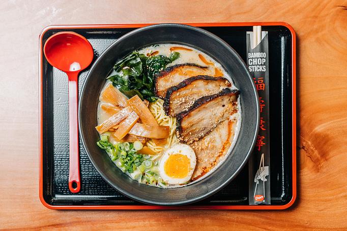 Product: our most traditional ramen. rich and hearty pork broth, tokyo wavy noodles, green onion, pork belly, wakame seaweed, molten egg, bamboo shoots, fried garlic and sesame seeds - RAMEN-SAN Whisky Bar in Fulton Market - Chicago, IL Japanese Restaurants