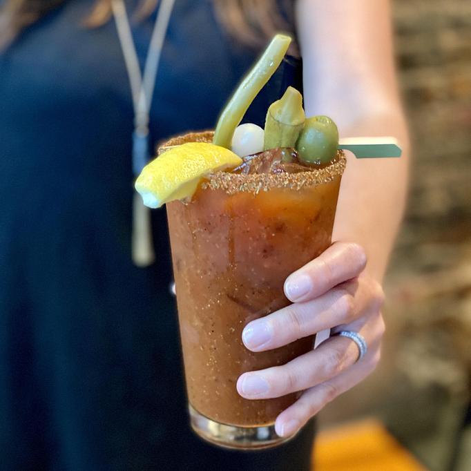 Product: RED FISH MARY - Housemade Bloody Mary Mix, Vodka, Seasoned Rim, Pickled Vegetables - Red Fish Grill in French Quarter - New Orleans, LA American Restaurants
