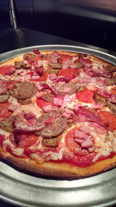 Product: gluten free (make any one of our pizzas a gluten free or build your own in a 14" size only) - Rocky's Pizza in Huntersville, NC - Huntersville, NC Italian Restaurants