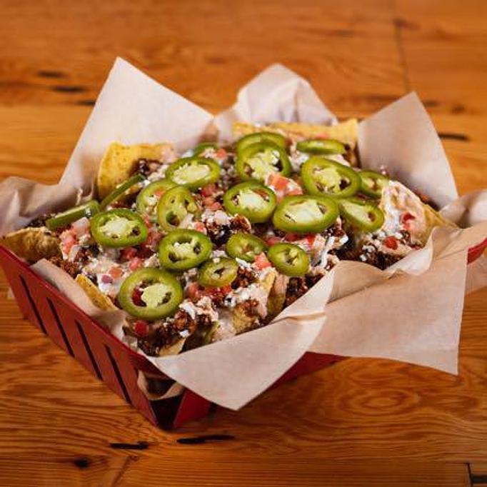 Product: Pictured w/ Chorizo Sausage - Roosters in Mobile, AL Bars & Grills