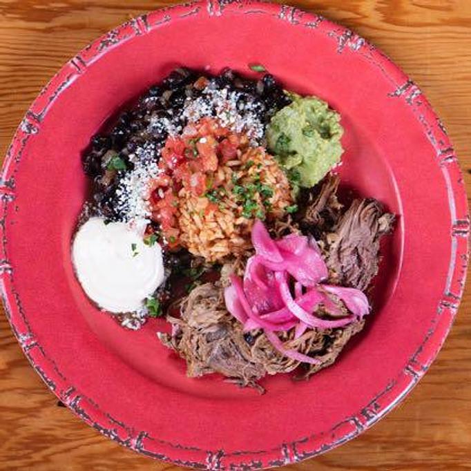 Product: Pictured w/ Cuban Pork - Roosters in Mobile, AL Bars & Grills