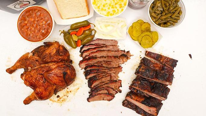 Product: Family Pack with Brisket, Chicken and Pork Ribs and Pinto Beans, Creamed Corn and Green Beans - Smokey Mo’s BBQ in Spring Branch, TX Barbecue Restaurants