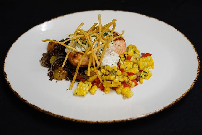 Product: Grilled Salmon
Grilled street corn relish, red quinoa with heirloom tomatoes, cilantro crema, tortilla frizzles - Stables Ranch Grille - Restaurant-Reservations in Tubac, AZ American Restaurants