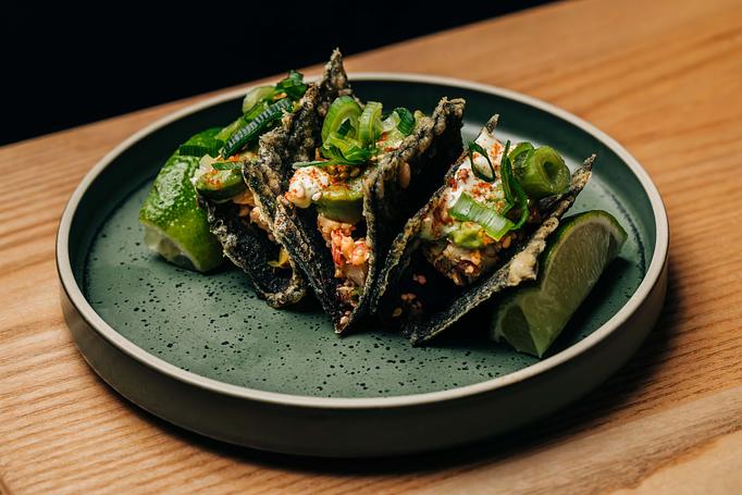 Product: spicy octopus "tacos" in crispy nori shells.  all are garnished with wasabi tobiko mayo, avocado puree, green onion, and togarashi ichimi - Sushi San - Reservations in River North - Chicago, IL Japanese Restaurants