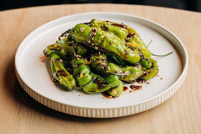 Product: shishito peppers are blistered, dusted with sesame seeds, and served with a side of sweet and savory black garlic miso. - Sushi San - Reservations in River North - Chicago, IL Japanese Restaurants