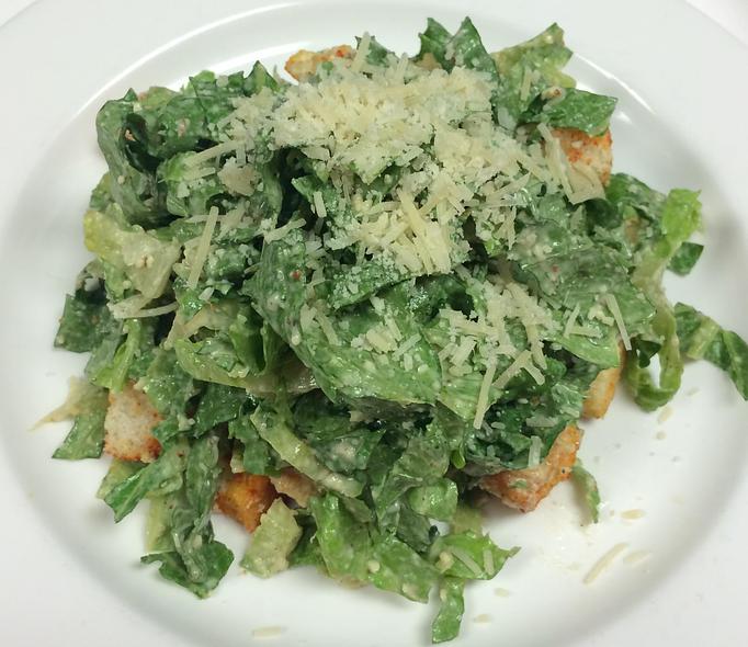 Product: Caesar Salad Topped with Parmesan & Croutons - The Caboose Restaurant in Located in Beautiful Downtown McComb - McComb, MS Cajun & Creole Restaurant