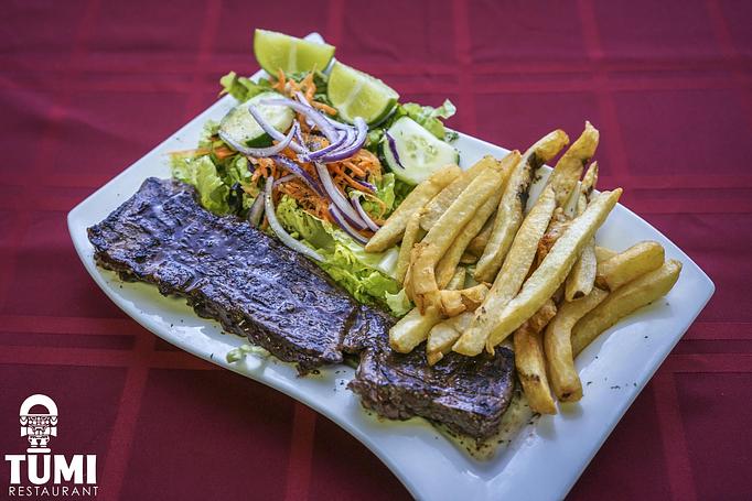 Product: Choose two sides. This picture was with Tumi fries and salad - Tumi Peruvian Restaurant in Elizabeth, NJ Latin American Restaurants