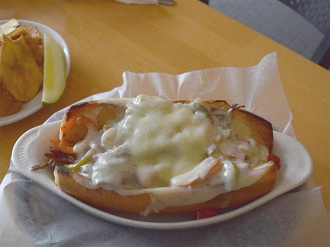 Product: Hot Italian Beef - Italian beef, sauté onions & peppers, provolone, served on italian roll - West Allis Cheese & Sausage Shoppe in Milwaukee, WI Meat Products