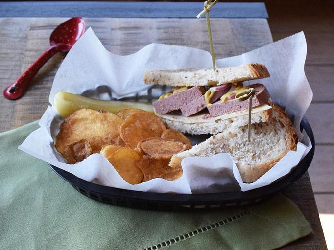 Product: Nueske's Liver Sausage - nueske's liver sausage with swiss, onion, on rye - West Allis Cheese & Sausage Shoppe in Milwaukee, WI Meat Products