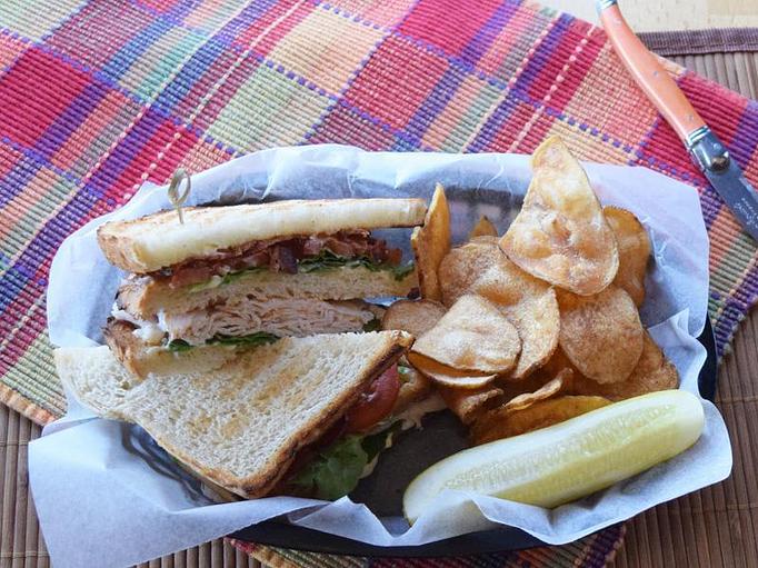 Product: Nueske's Clubhouse - blt with turkey between three layers of bread - West Allis Cheese & Sausage Shoppe in Milwaukee, WI Meat Products