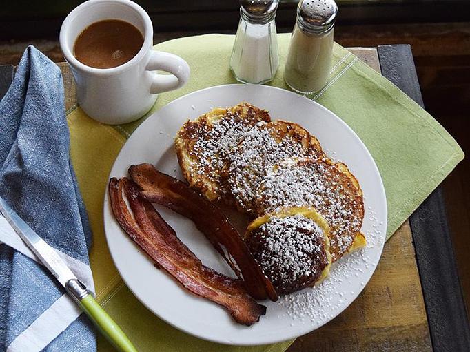 Product: Simma's French Toast - french toast made with Simma's Morning Buns served with Nueske's bacon - West Allis Cheese & Sausage Shoppe in Milwaukee, WI Meat Products