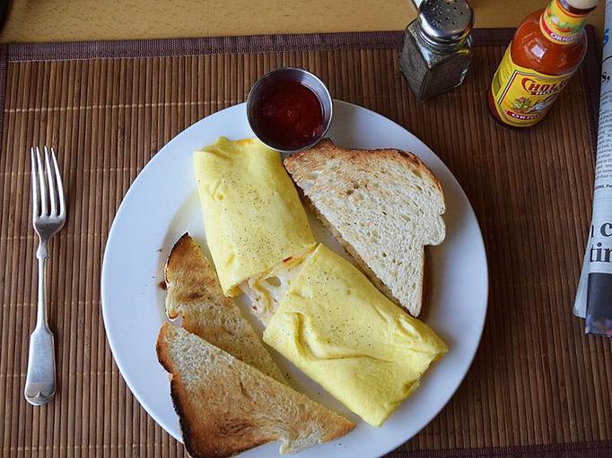 Product: Three Cheese Omelet - 3 eggs, cheddar, mozzarella, pepper jack served with toast - West Allis Cheese & Sausage Shoppe in Milwaukee, WI Meat Products
