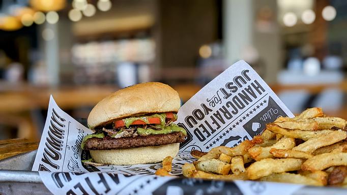 Product: Impossible Burger, red onion, tomato, avocado jalapeno salsa on a soft bun. $1 will be donated to Friends of Middleton Public Library/Bookmobile Fund. - Longtable Beer Cafe in Downtown Middleton - Middleton, WI American Restaurants