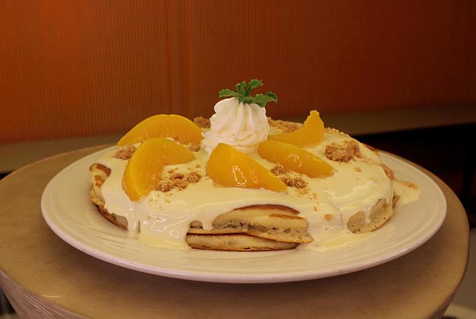 Product: Short Stack of Pancakes with Peaches & Cream Topping - M.a.c. 24/7 in Waikiki - Honolulu, HI American Restaurants