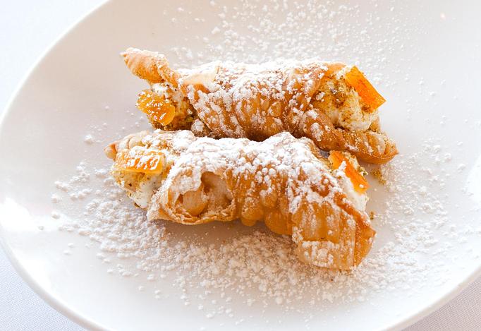 Product: Crisp pastry filled with sweetened ricotta, candied citrus, chocolate chips and crushed pistachio - Angelino Restaurant in Sausalito, CA Italian Restaurants