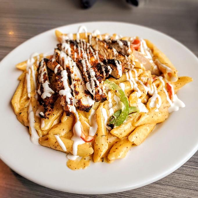 Product: Cajun Chicken Pasta - Bella Milano in Springfield, IL Pizza Restaurant