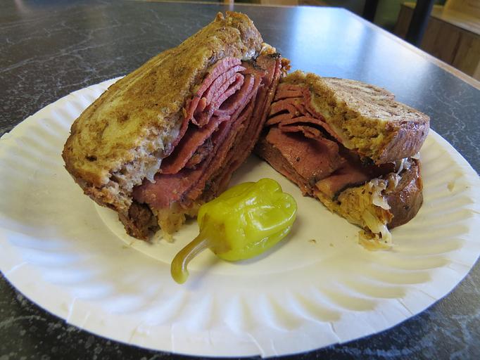 Product: Reuben - Choice of corned beef or pastrami on marbled rye with sauerkraut, thousand island and swiss cheese - Biggies in Buena Vista, CO Restaurants/Food & Dining