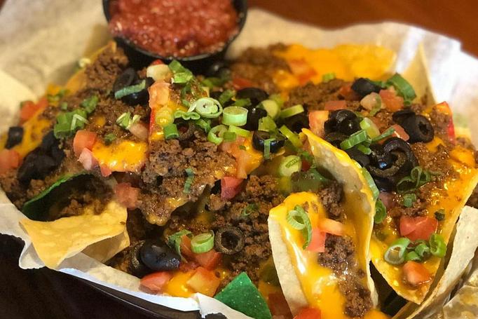 Product: Choose taco meat, pulled pork or pulled chicken. - Buffalo Phil's Pizza & Grille in The Waterpark Capital of the World- Wisconsin Dells! - Wisconsin Dells, WI American Restaurants