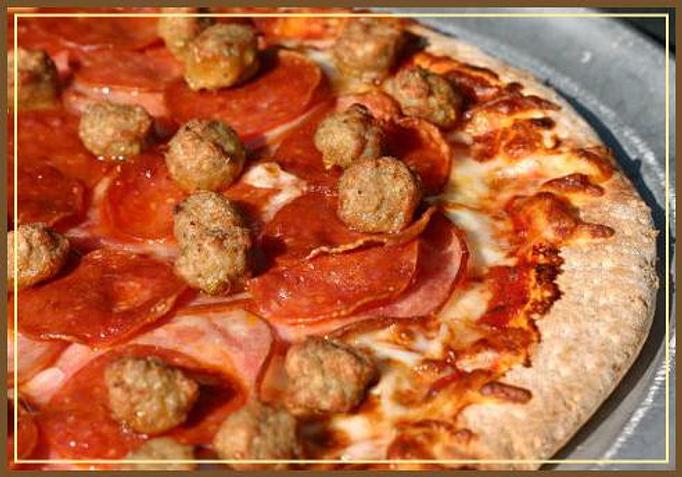 Product: Canadian Bacon, Pepperoni, Sausage, and Ground Beef - Garibaldi's Pizza in East Memphis Area, U of M Area, and Saddle Creek Area (Germantown/Saddle Creek) - Memphis, TN Pizza Restaurant