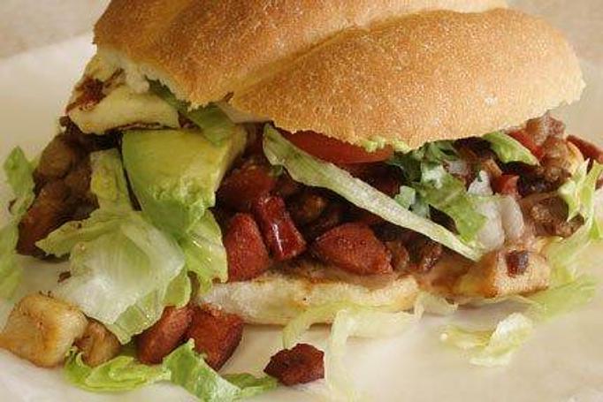 Product: Sandwich served on Mexican style Telera bread with your choice of Meat, Refried Beans, Onion, Cilantro, Lettuce, Tomato, Queso Blanco and Avocado! - La Lupita Tacos Mexicanos in Olneyville - Providence, RI Mexican Restaurants