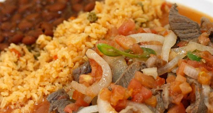 Product: Your choice of up to two types of Meat sliced and grilled with Onions, Red & Green Peppers served with (5) Corn Tortillas and (2) Sides - La Lupita Tacos Mexicanos in Olneyville - Providence, RI Mexican Restaurants