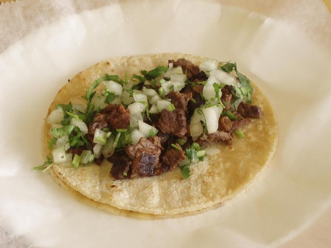 Product: Steak Taco (Regular) - Onions & Cilantro - La Lupita Tacos Mexicanos in Olneyville - Providence, RI Mexican Restaurants